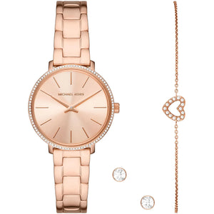 Authentic real-life photo of Michael Kors MK1040 gift set showing rose gold watch with matching heart bracelet and earrings