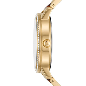 Detailed view of gold-tone crown on Michael Kors Melissa MK4395 women's quartz battery watch with crystal dial