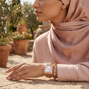 Elegant woman wearing Michael Kors Emery MK4641 with rose gold-tone case and stunning crystal borders jewelry style watch