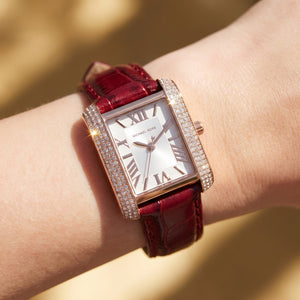 Close up shot of Michael Kors MK4689 on wrist showing white dial and rose gold numerals