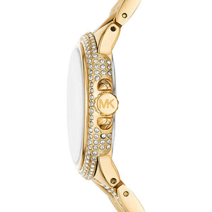 Angled real-life photo of Michael Kors MK4801 showing the polished gold case and scale-link details