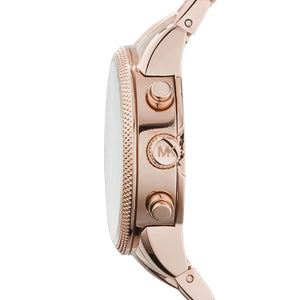 Detailed view of rose gold-tone crown and pushers on Michael Kors Ritz MK6077 with rose gold dial and metal bracelet