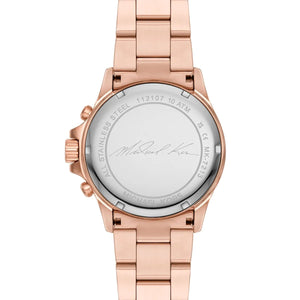 Caseback of Michael Kors Everest MK7213 women's quartz battery watch showing technical specs white dial and rose gold metal bracelet