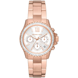 Michael Kors Everest MK7213 women's quartz battery watch with white dial, baguette crystal-encrusted rose gold bezel, rose gold stainless steel bracelet main view