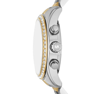 Detailed view of silver-tone crown and pushers on Michael Kors Lexington MK7303 women's quartz battery watch with green dial