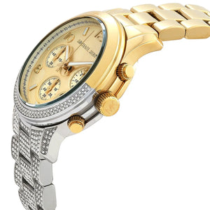 Detailed view of gold-tone crown and pushers on Michael Kors Runway MK7329 with gold dial and crystal metal bracelet