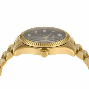 Side view photo of Michael Kors MK7449 showing case thickness and gold crown detail