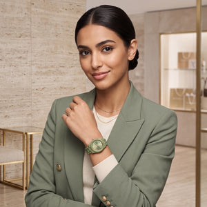 Lifestyle image featuring the Michael Kors Lexington Green MK7517LE women's watch.
