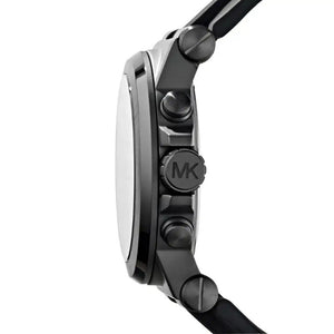 Close-up of a Michael Kors watch with a black strap and silver case on a white background.