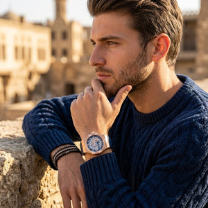 Elegant man wearing Maserati Potenza Limited Edition R8821108022 automatic watch with rose gold case and luxury skeleton dial