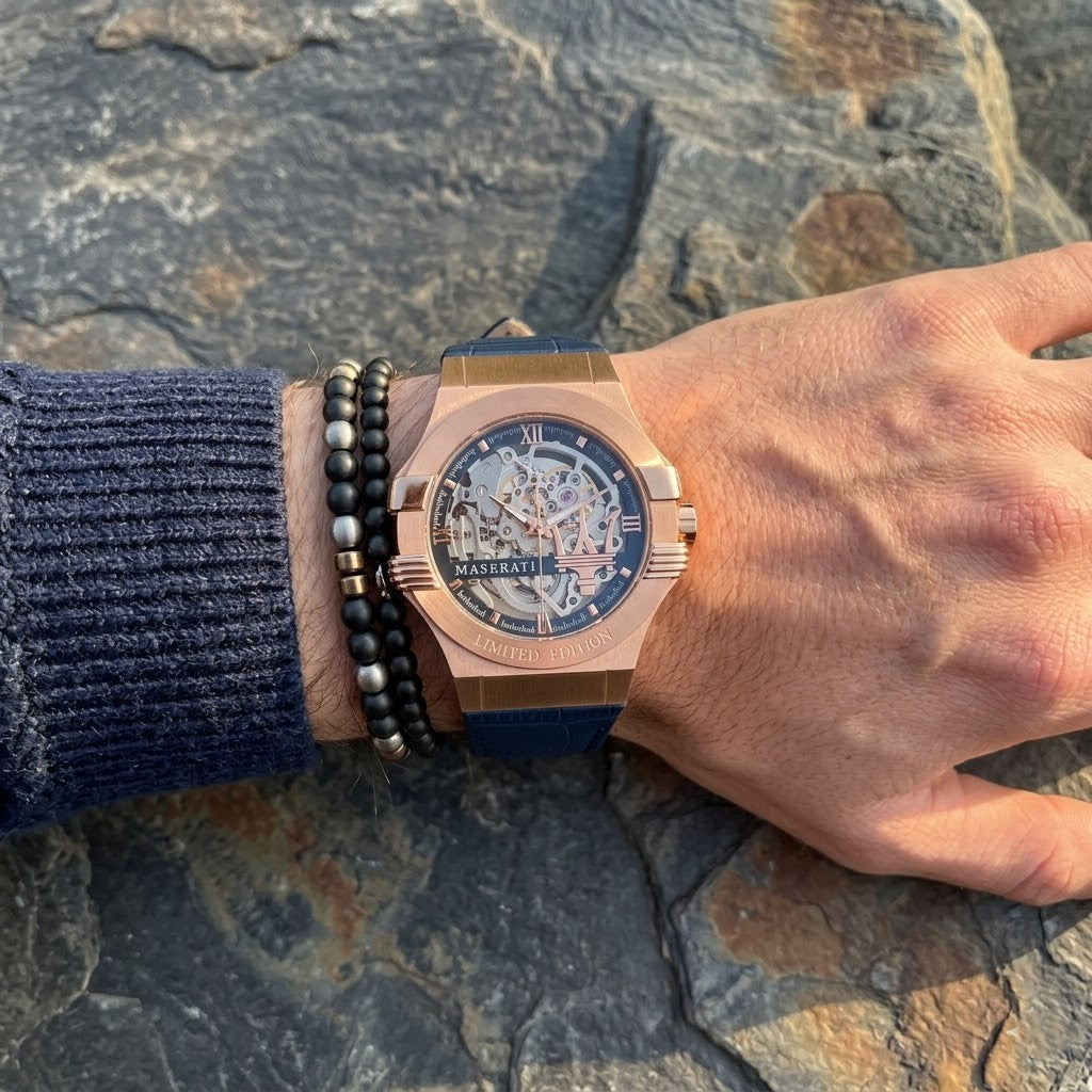 Close up of Maserati Potenza Limited Edition R8821108022 automatic watch on wrist showing skeleton dial and rose gold-tone Trident logo