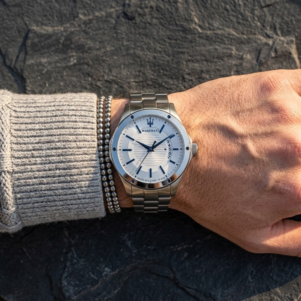 Close up of Maserati Circuito R8853127001 men's quartz battery watch on wrist showing silver dial and blue-tone details