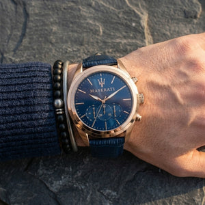 Close up of Maserati Traguardo R8871612015 men's quartz battery watch on wrist showing blue sunray dial and blue leather strap
