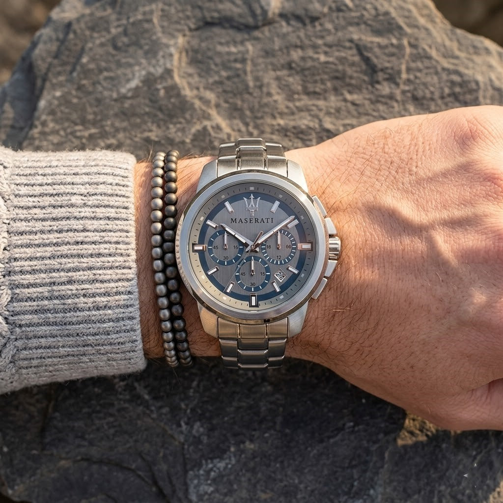 Close up of Maserati Successo R8873621006 men's quartz battery watch on wrist showing gray racing dial and silver case