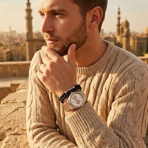 Elegant man wearing Maserati Legend R8873638002 men's quartz battery watch with two-tone rose gold case and luxury white dial