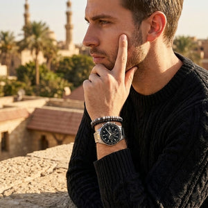 Elegant man wearing Maserati Sfida R8873640015 men's quartz battery watch with silver-tone case and diver style dial