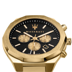 Gold Maserati watch with black dial on a white background