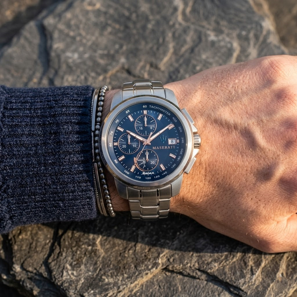 Close up of Maserati Successo Solar R8873645004 solar powered watch on wrist showing blue dial and rose gold-tone markers
