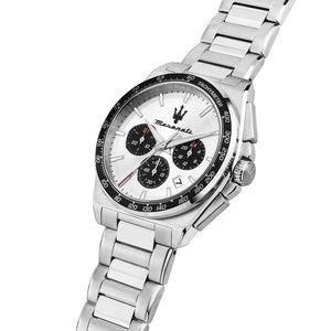Silver watch with a white face on a white background