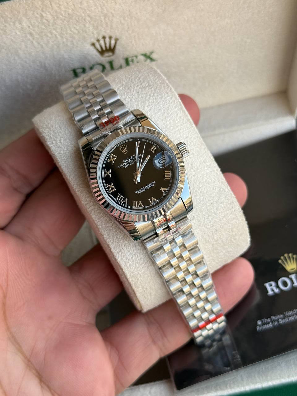 Rolex Datejust 31mm women's mirror watch, black Roman numeral dial – view 2