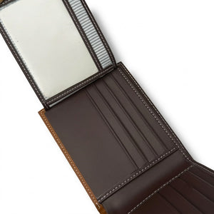 Live interior view of the opened Timberland smooth brown leather bifold wallet showcasing symmetrical multi-card slots and premium stitched edges