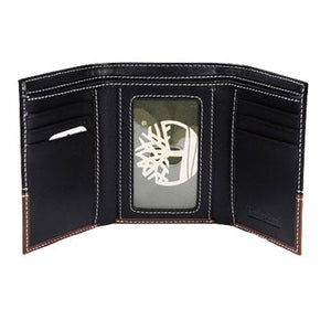 Live open layout view of the opened Timberland smooth leather trifold wallet interior showcasing the three folding panels and clear transparent ID window slot
