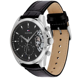 Angled view of Tommy Hilfiger 1710449 highlighting the polished silver-tone case and premium black leather strap