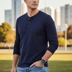Male model wearing Tommy Hilfiger 1710605 black leather watch with a classic formal outfit