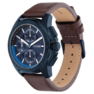 Left side perspective of the blue case and detailed stitching on the brown leather strap of the Tommy Hilfiger watch