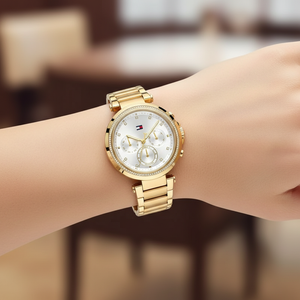 Close up shot of Tommy Hilfiger 1782703 watch on wrist showing the sparkling crystals and silver dial