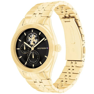 Angled view of the Tommy Hilfiger 1782717 highlighting the gold fluted bezel and crown