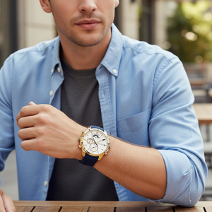 Male model wearing Tommy Hilfiger 1791353 gold watch with a casual sporty outfit