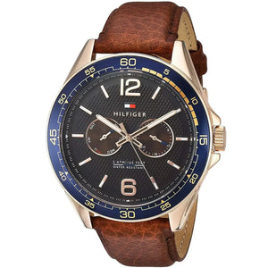 Angled view of the Tommy Hilfiger 1791367 highlighting the rose gold case and blue bezel contrast
