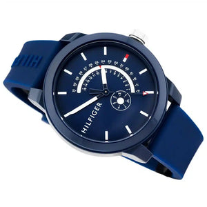 Angled view of Tommy Hilfiger 1791482 highlighting the sleek blue case and durable navy blue rubber strap