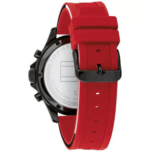 Left side perspective of the black case and red silicone rubber strap on the Tommy Hilfiger watch