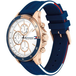 Angled view of Tommy Hilfiger 1791778 highlighting the bold blue tachymeter bezel and gold-tone case