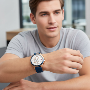 Man wearing Tommy Hilfiger Bank gold and blue watch for a dynamic and sporty everyday look