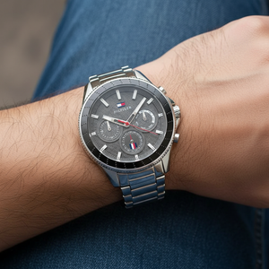 Close up shot of Tommy Hilfiger 1791857 watch on wrist showing the carbon-fiber style dial texture