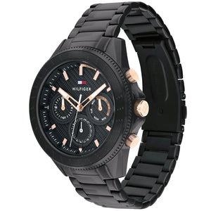 Angled view of Tommy Hilfiger 1791858 highlighting the polished black case and integrated stainless steel bracelet