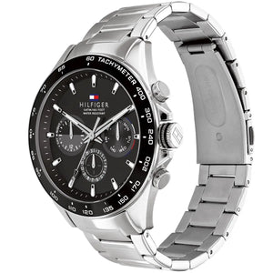 Man wearing Tommy Hilfiger Damon silver metal watch for a sophisticated, classic, and elegant professional look