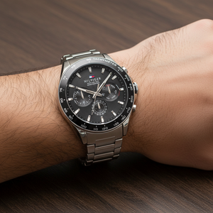 Close up shot of Tommy Hilfiger 1791967 on wrist showing the white dial with multi-function sub-dials and silver-tone hands