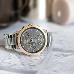 Side profile view of the 10mm case of the Tommy Hilfiger 1792050 showing rose gold details