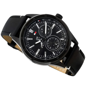 Angled shot highlighting the black leather strap and white stitching of Tommy Hilfiger 1791638