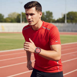 Man wearing sporty Tommy Hilfiger Bank 1792170 watch with red rubber strap