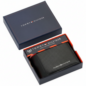 Front view of Tommy Hilfiger Black Pebbled Leather Wallet featuring smooth vertical strip and silver logo text