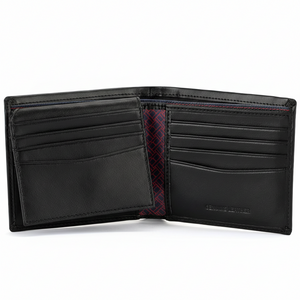 Interior view of Tommy Hilfiger black wallet featuring extra capacity flap, card slots, and geometric pattern lining