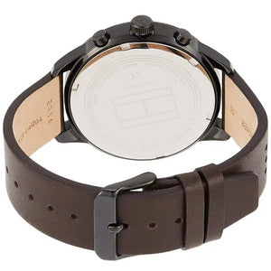 Angled shot highlighting the dark brown perforated leather strap of Tommy Hilfiger 1791577