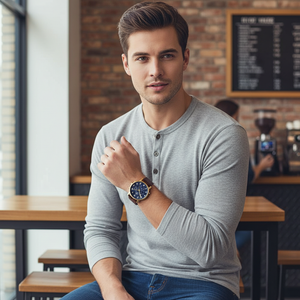 Man wearing elegant Tommy Hilfiger Daniel 1710380 watch with brown leather strap
