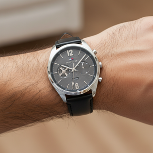 Close up of black dial and semi-skeleton movement window of Tommy Hilfiger 1791548