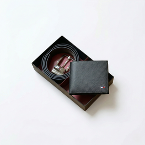 Black leather wallet and belt set in a box on a white background
